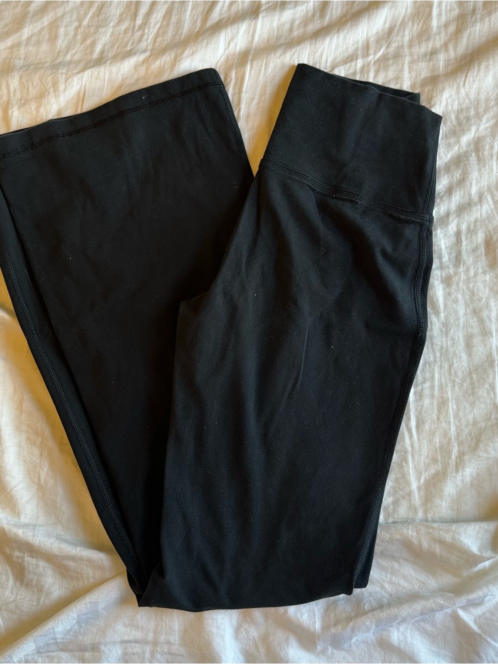 TNA women’s Hold-It flare high rise leggings